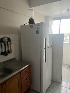 Η κουζίνα ή μικρή κουζίνα στο Apartamento central