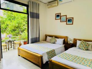 Postel nebo postele na pokoji v ubytování Shark Homestay + 120 fotografií