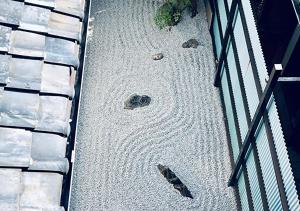 an overhead view of a sidewalk with rocks and a fence at Kyoto - House / Vacation STAY 80314 in Kyoto