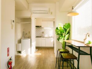 Kuchyň nebo kuchyňský kout v ubytování Aiwa Mansion / Vacation STAY 80391