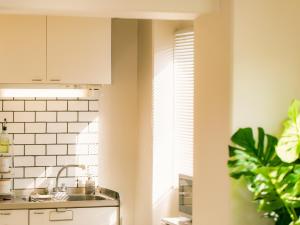 Kuchyň nebo kuchyňský kout v ubytování Aiwa Mansion / Vacation STAY 80391