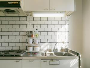 Kuchyň nebo kuchyňský kout v ubytování Aiwa Mansion / Vacation STAY 80391 + 15 fotografií