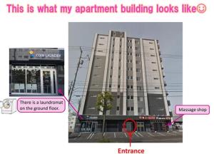 ein Gebäude mit einem roten Schild davor in der Unterkunft Suncourt Hondori Garden Hills / Vacation STAY 7593 in Sapporo