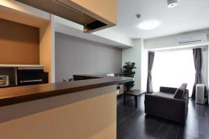 Η κουζίνα ή μικρή κουζίνα στο Suncourt Hongo Dori Garden Hills / Vacation STAY 7620