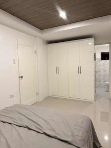 Postel nebo postele na pokoji v ubytování Carag Residences