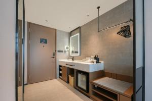 Ένα μπάνιο στο Atour Hotel Tonghui North Road Qianjiang Century City