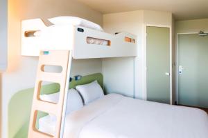 Un ou plusieurs lits superposés dans un hébergement de l'établissement Ibis Budget Clermont Ferrand - Le Brezet - Aeroport