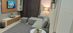 Χώρος καθιστικού στο Khaira Shakilla House 3 Syariah Limbangansari