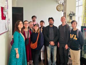 a group of people posing for a picture at Max Guest House in Agra