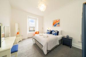 Ένα ή περισσότερα κρεβάτια σε δωμάτιο στο No 69 Gray Street