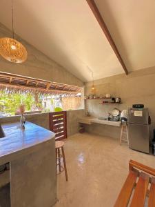 Kuchyň nebo kuchyňský kout v ubytování Akap Homestay - Nkd