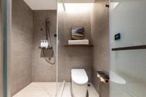 Koupelna v ubytování Atour Hotel Urumqi Hongshan Park North Gate Metro Station