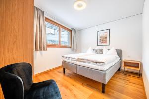 Cama ou camas em um quarto em Haus Eratic