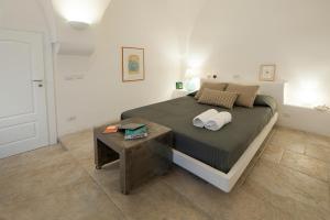 Ein Bett oder Betten in einem Zimmer der Unterkunft Casaterramare