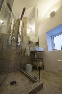 Ein Badezimmer in der Unterkunft Casaterramare