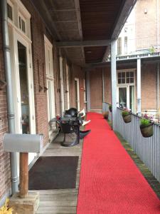 a red carpet on the side of a building at Labnul50 Groningen in Groningen