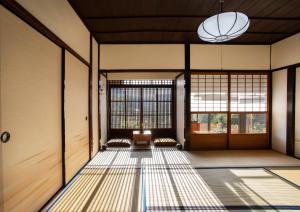 a room with a hallway with doors and windows at Kameoka - House - Vacation STAY 84233 in Kameoka