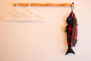 a hook with two hangers on a wall at Otaro Village - Vacation STAY 96435v in Otaru