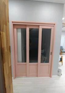 a sliding glass door in a room at Hallim House in Jeju +11 photos