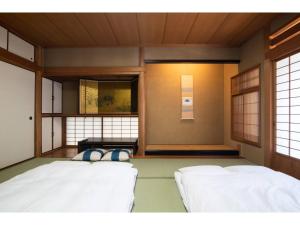 Giường trong phòng chung tại Arbor house - Vacation STAY 86735