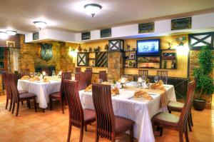 A restaurant or other place to eat at The Castle Complex