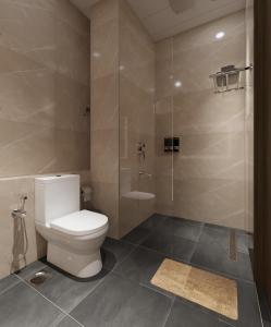 a bathroom with a toilet and a shower at Cloud 11 S Hive in Gurgaon
