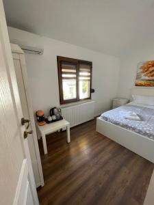 Ένα ή περισσότερα κρεβάτια σε δωμάτιο στο Marisah Residence #12