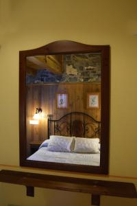 Postel nebo postele na pokoji v ubytování Trisqueles y Buganvillas II