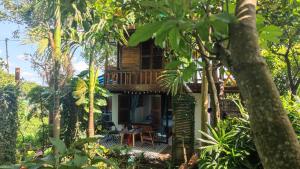 a tree house in the middle of the forest at Natural Garden BMT in Buon Ma Thuot