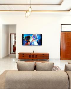 Μια τηλεόραση ή/και κέντρο ψυχαγωγίας στο Restel Apartments +3 φωτογραφίες