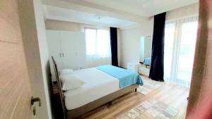 Katil atau katil-katil dalam bilik di Yüksel Apart Private Pension 3rooms