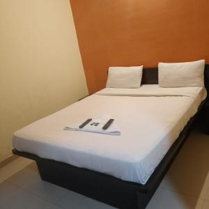 Postel nebo postele na pokoji v ubytování Hotel RajYog