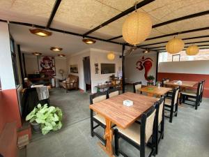 a dining room with a table and some chairs at Ganesh Guest House in Bhaktapur