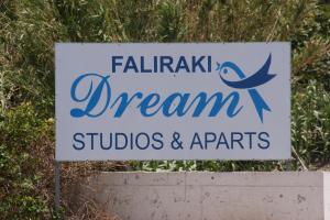 a sign for aiami dream studios and agents at Faliraki Dream Studios & Apartments in Faliraki