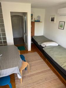 Ένα ή περισσότερα κρεβάτια σε δωμάτιο στο Balaton Vibe Apartman