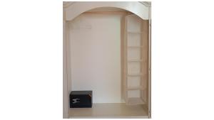 a closet with an empty shelf and a box at Masi suite in Monopoli