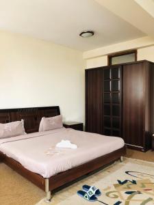 Ένα ή περισσότερα κρεβάτια σε δωμάτιο στο Eliab Hotel