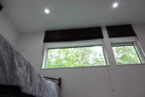 two windows in a white room with black blinds at CLOUD9 - Vacation STAY 45825v in Rusutsu +1 photo
