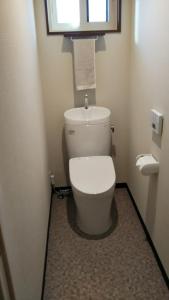 a bathroom with a white toilet in a room at KAINOSATO - Vacation STAY 08807v in Azagawa