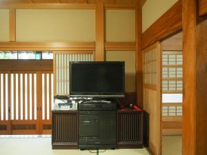 a room with a flat screen tv on a stand at Nakagawa Bettei - Vacation STAY 9303 in Otawara