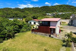 an aerial view of a house with a yard at Me-fi-You Ishigaki Island - Vacation STAY 95379 in Ishigaki Island