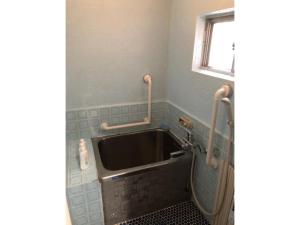 a bathroom with a sink and a window at Masaru House - Vacation STAY 9439 in Osaka +28 photos