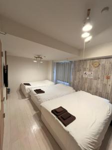 Postel nebo postele na pokoji v ubytování Green House Nakano Fujimicho - Vacation STAY 65988v