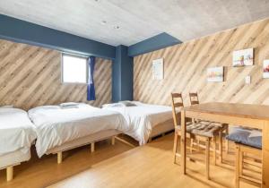 Postel nebo postele na pokoji v ubytování Green House Nakano Fujimicho - Vacation STAY 66008v