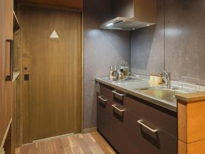 a bathroom with a sink and a mirror at Villa Yoshino - Vacation STAY 01536v in Azumino +16 photos