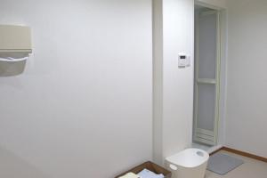 a white bathroom with a toilet in a room at Guest House Orange no Kaze - Vacation STAY 01298v in Imabari +4 photos