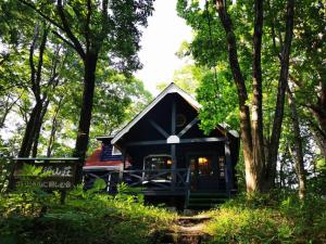 a small cabin in the middle of a forest at Nasusanso - Vacation STAY 9643 in Nasu-yumoto