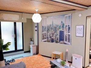 a living room with a view of a city at Osaka - House - Vacation STAY 9690 in Osaka