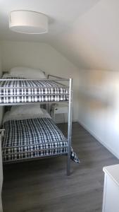 Postel nebo postele na pokoji v ubytování "Gruppenspaß" im schönen Ferienhaus für 12 Personen und Hund im Oberharz