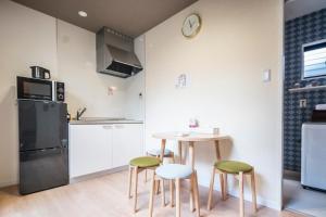 Kuchyň nebo kuchyňský kout v ubytování KYOSTAY Iroha Soragi 2 - Vacation STAY 04182v